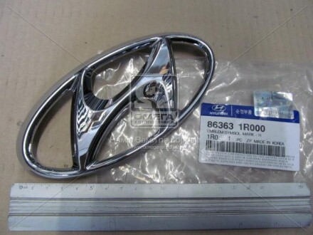 Емблема передня решітки Hyundai Accent 11-/Solaris 10- (Mobis) Hyundai/Kia/Mobis 863631R000