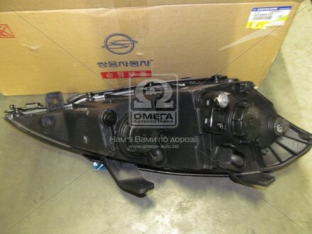 Фара левая SSANGYONG 8310309102