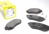 Тормозные колодки дисковые передние с звуковым предупреждением износа TEXTAR 2386501 (фото 1)