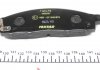 Тормозные колодки дисковые передние с звуковым предупреждением износа TEXTAR 2452901 (фото 4)